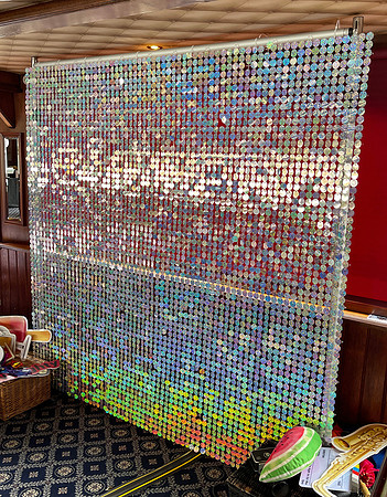 Holographic shimmer wall